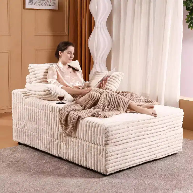Poltrona chaise longue oversize da interno con pouf contenitore, divano letto in velluto a coste imbottito Cloud Couch con 3 cuscini, poltrona letto singola