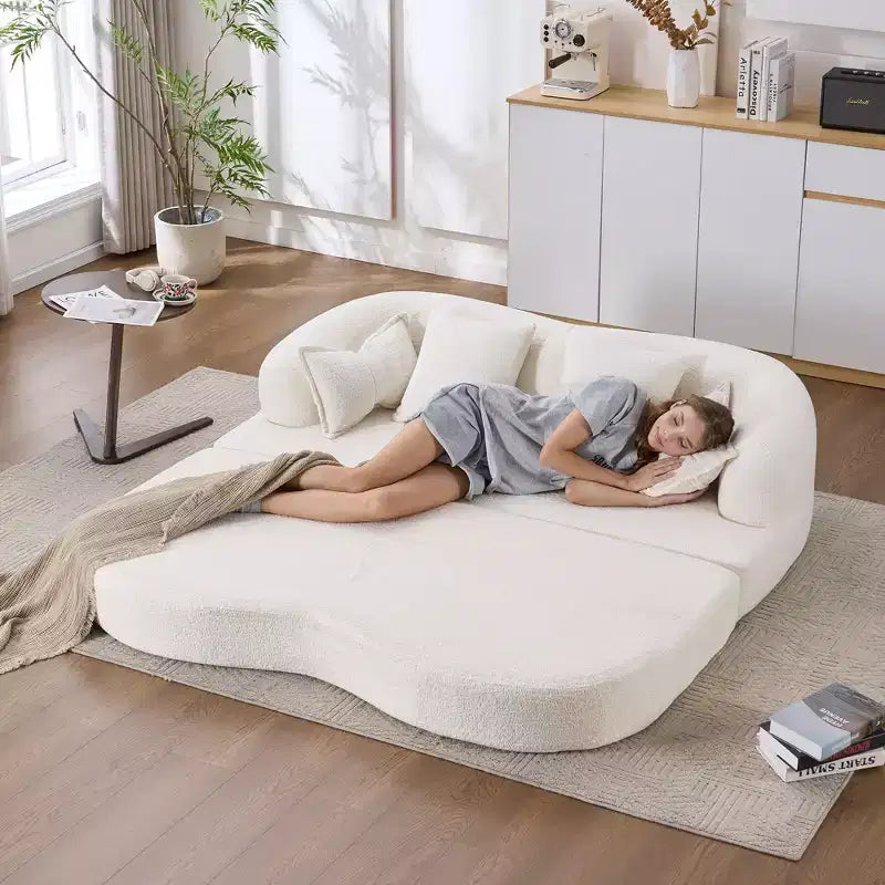 Divano letto pieghevole moderno Okak 2-in-1 senza struttura con 4 cuscini, futon in tessuto ciniglia per soggiorno, appartamento