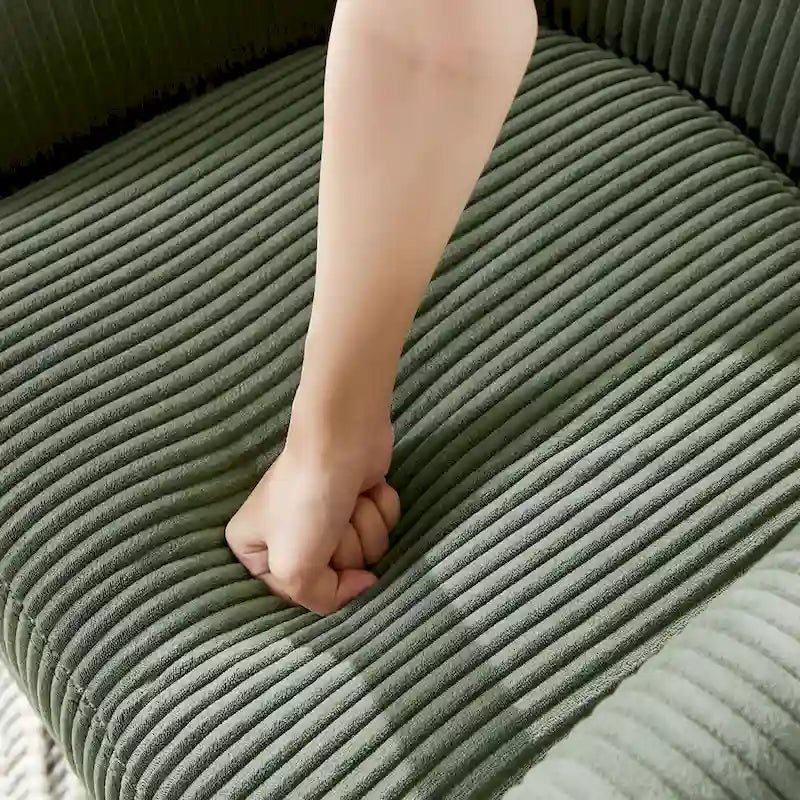 Poltrona imbottita girevole a 360° verde 26.38 con pouf