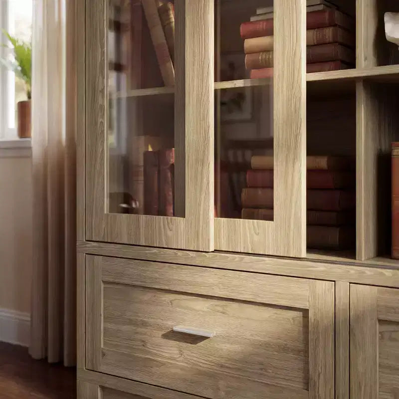 Libreria espositiva Famapy in rovere chiaro: 63W, ante scorrevoli in vetro + cassetto. Ampio organizer per biblioteche domestiche e soggiorni