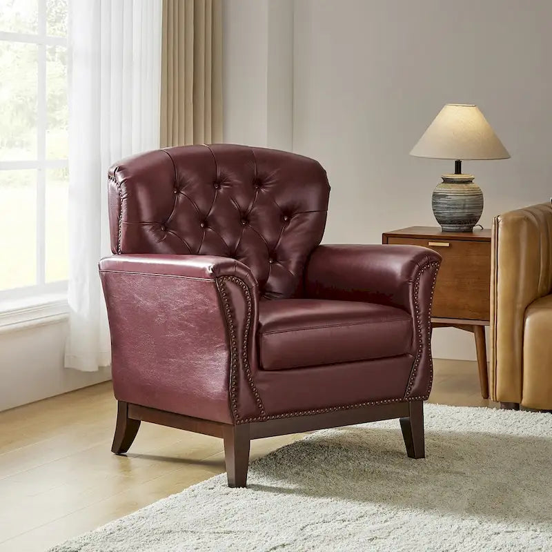 Poltrona occasionale Burt in vera pelle, con schienale alto capitonné di HULALA HOME