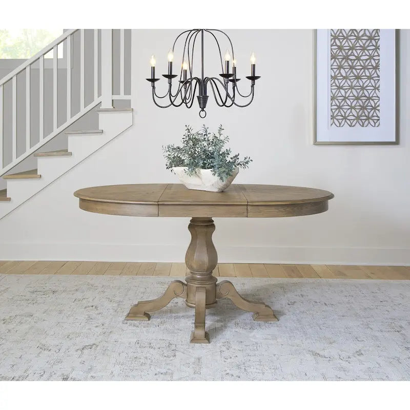 Table à dîner ronde sur pied Magnolia Manor avec rallonges escamotables - 2 finitions