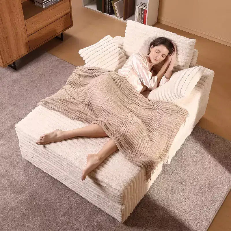Poltrona chaise longue oversize da interno con pouf contenitore, divano letto in velluto a coste imbottito Cloud Couch con 3 cuscini, poltrona letto singola
