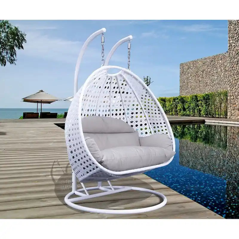 LeisureMod Sedia a Uovo Sospesa per 2 Persone con Supporto - Dondolo Pensile per Esterni/Interni in Rattan Intrecciato con Cuscini